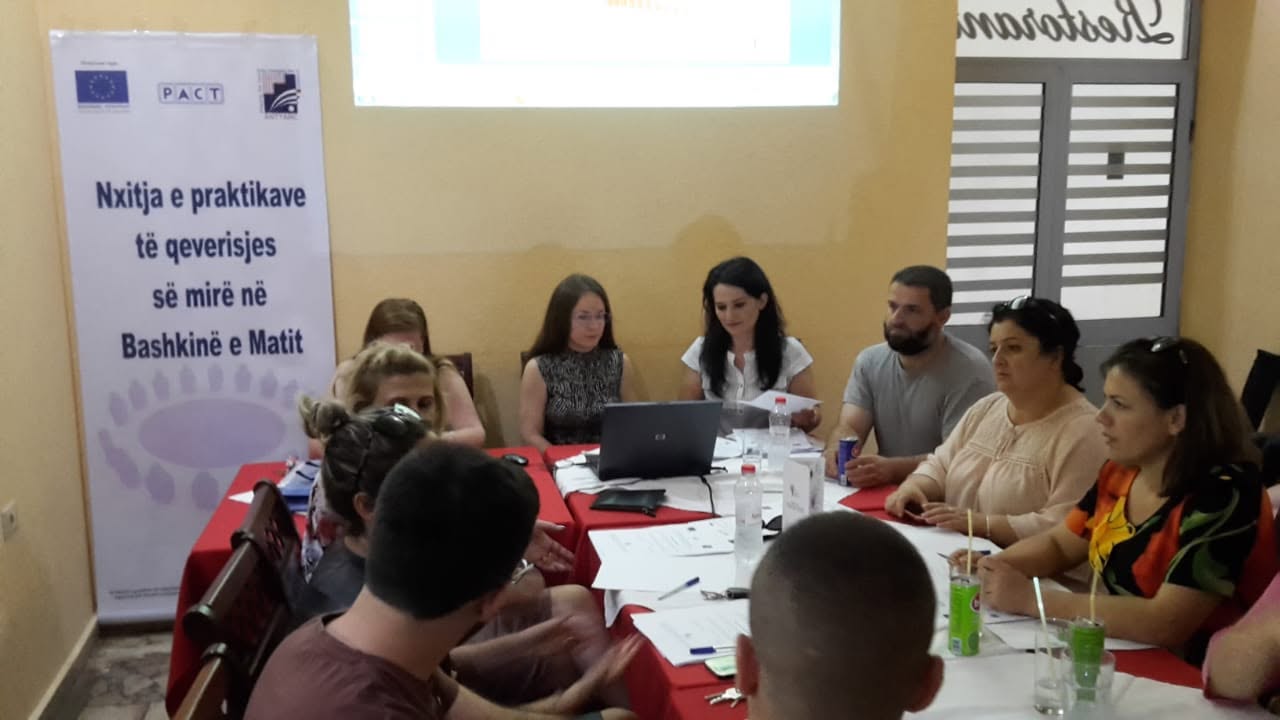 Group discussion around a meeting table