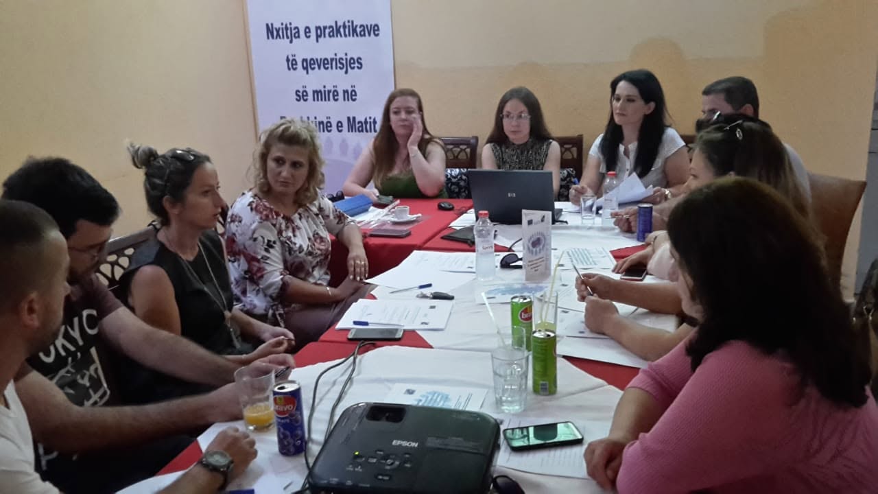 Participants in a round-table discussion